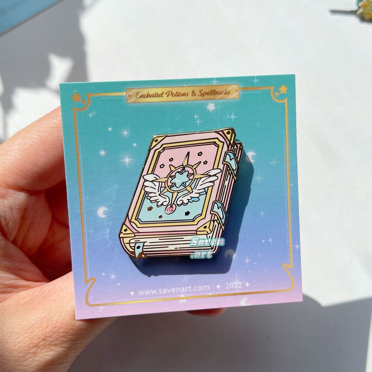 Enamel Pin: Winged Spell Book